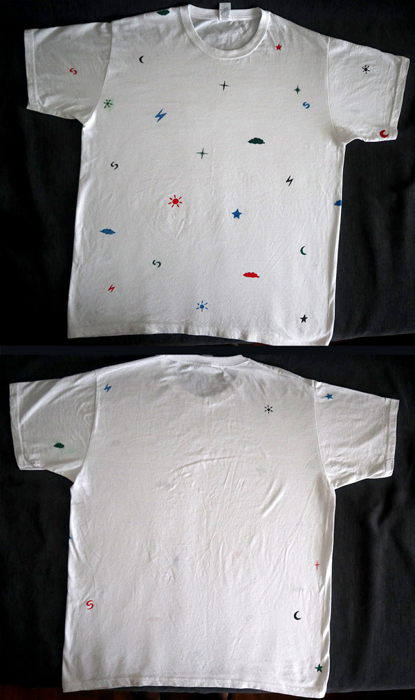 White T-shirts with handmade celestial bodies drawings